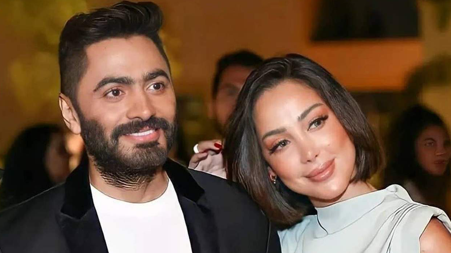 تامر حسني وبسمة بوسيل يحتفلان بتخرج ابنهما آدم تفاصيل بالصور